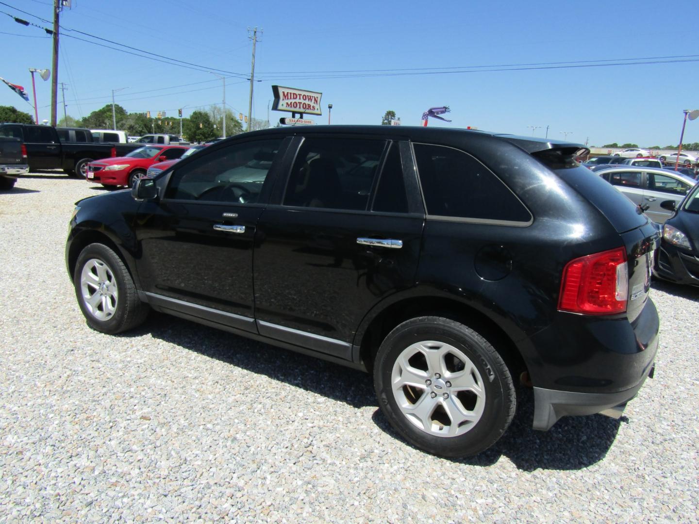 2011 Black /Tan Ford Edge SEL FWD (2FMDK3JC4BB) with an 3.5L V6 DOHC 24V engine, Automatic transmission, located at 15016 S Hwy 231, Midland City, AL, 36350, (334) 983-3001, 31.306210, -85.495277 - Photo#5